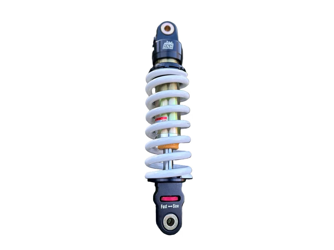 ETM Shock absorber on a rocky and grassy background