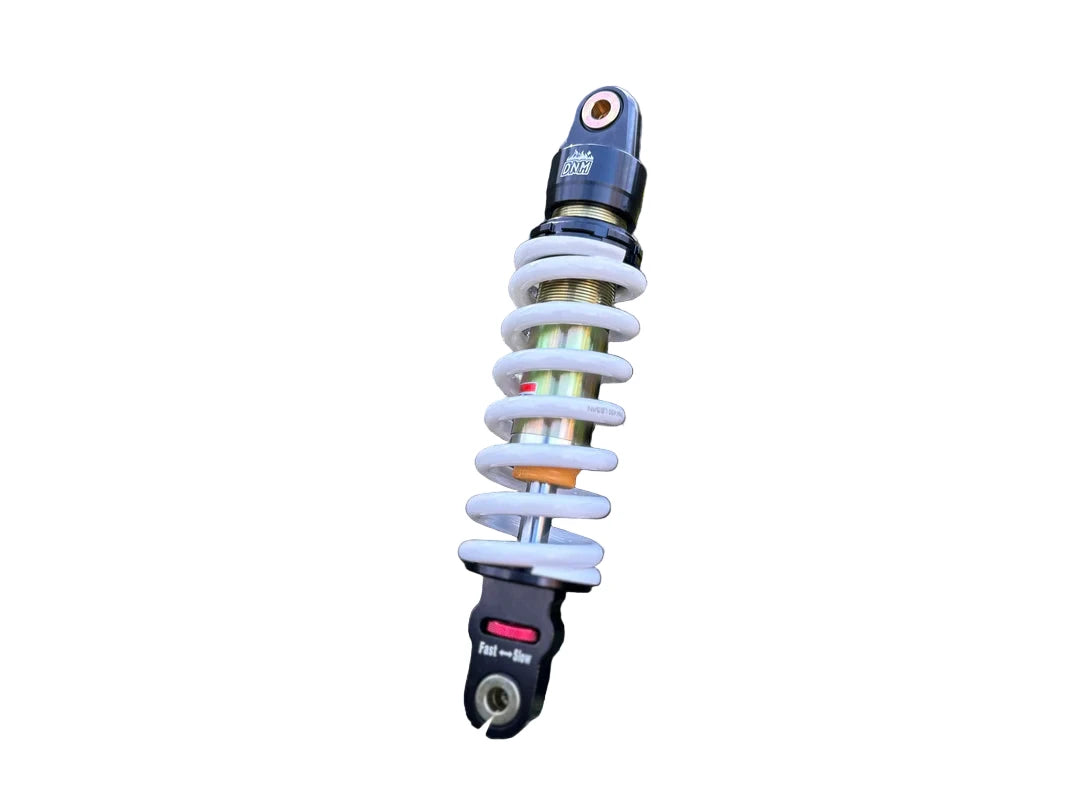 ETM Race Shock absorber on a rock with a natural background
