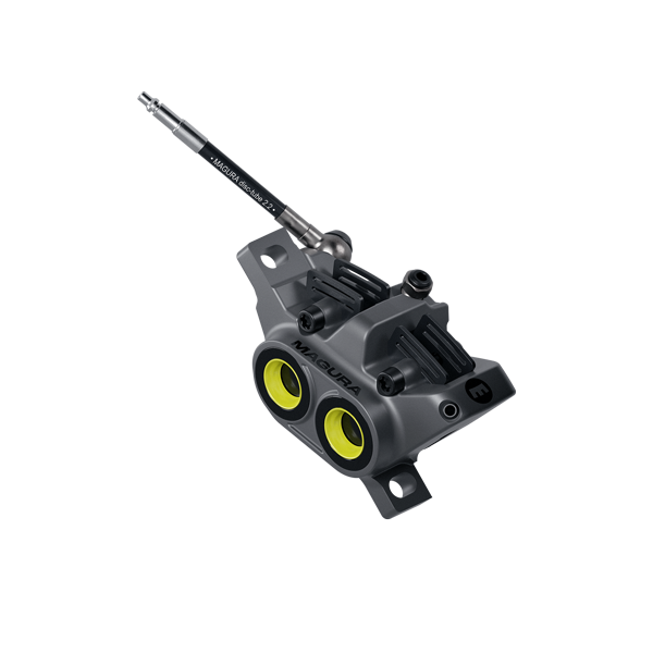 Gustav PRO E-MTB brake caliper showcasing 4-piston design, orange MC inlay, and caliper rings on black anodized finish.